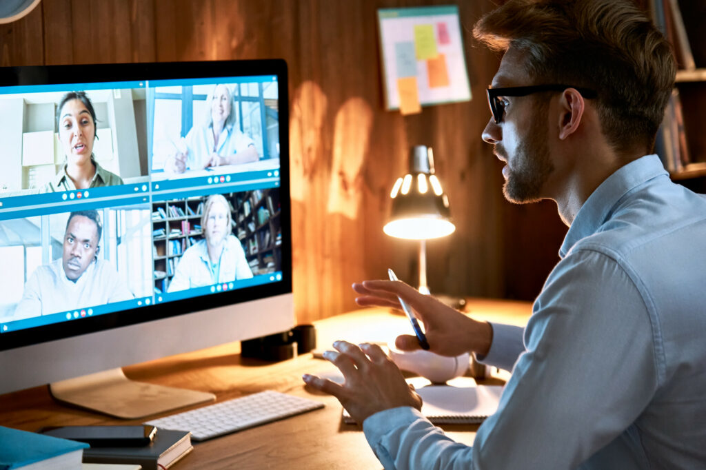 Businessman participating in a video conference call with colleagues